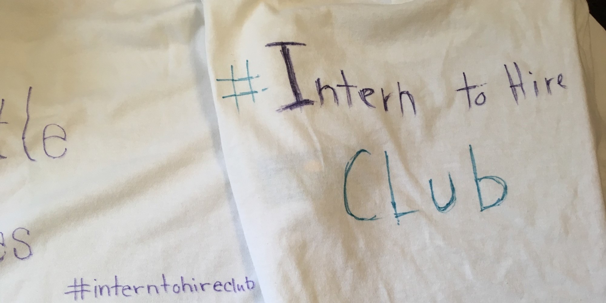 "Intern to Hire club" on white t-shirt made by former clinical training interns who are now employees